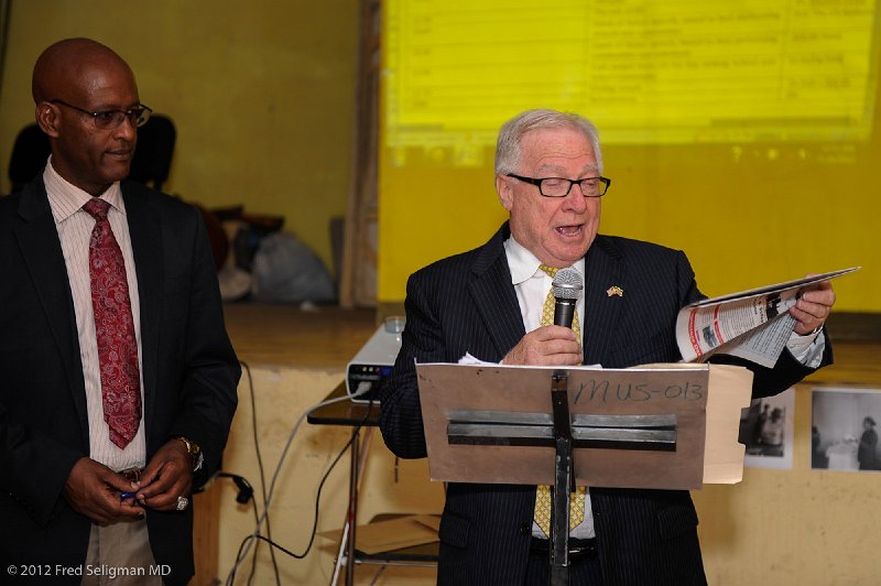 20120329_103005 Nikon D3S 2x3.jpg - Dr. Fish makes opening comments at ESRI Award Ceremony.   Dr. Menelik looks on and also translates.